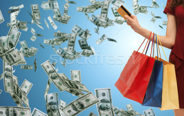 close up of woman with shopping bags and bank card Stock photo © dolgachov
