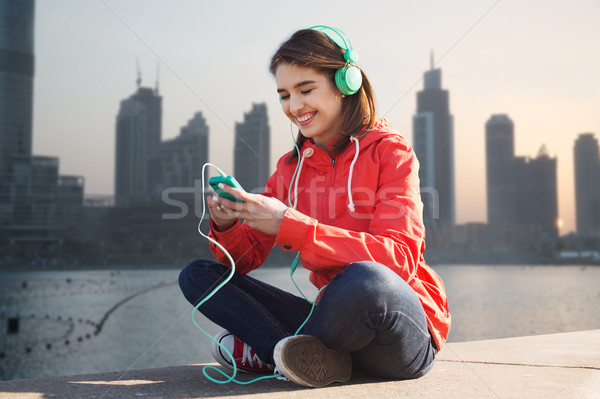 [[stock_photo]]: Heureux · jeune · femme · smartphone · casque · technologie · mode · de · vie