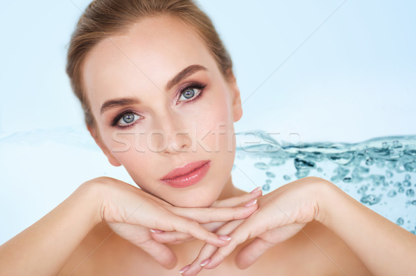 beautiful young woman face and hands Stock photo © dolgachov