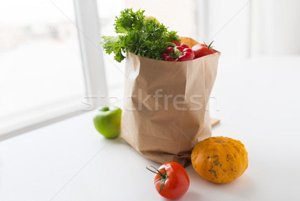 Stock photo: basket of fresh ripe vegetables at kitchen