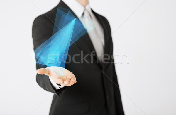 Zakenman tonen virtueel hologram mensen Stockfoto © dolgachov