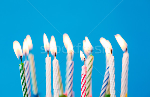 Bougies d'anniversaire brûlant bleu vacances célébration fête [[stock_photo]] © dolgachov
