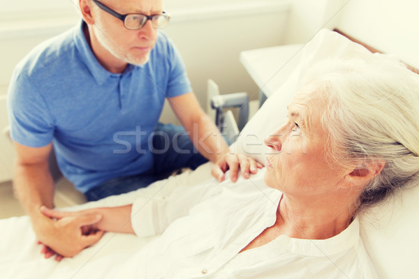 senior couple meeting at hospital ward Stock photo © dolgachov