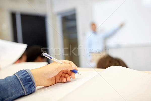 Studenten Hand schriftlich Notebook Vortrag Bildung Stock foto © dolgachov