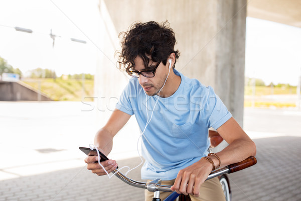 человека смартфон велосипед люди связи Сток-фото © dolgachov