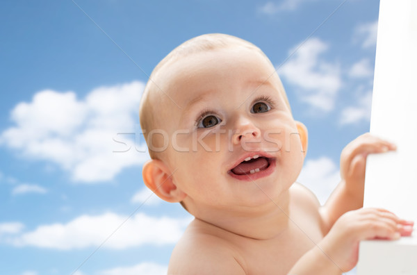 happy little baby boy or girl looking up Stock photo © dolgachov