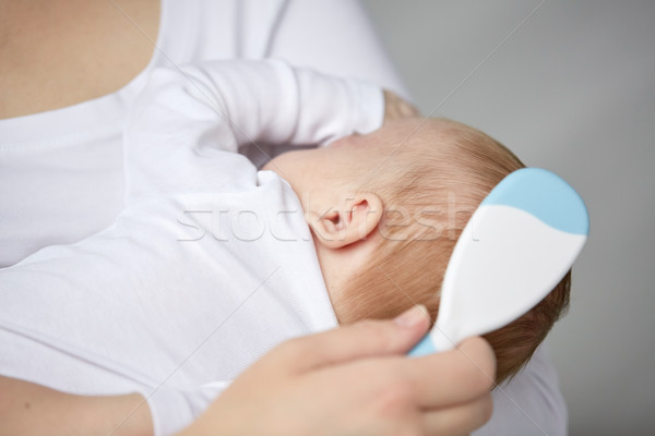 Közelkép anya újszülött baba haj család Stock fotó © dolgachov