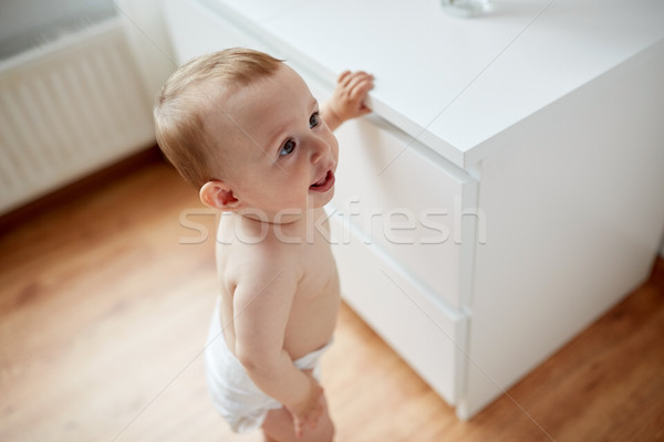 close up of happy little baby boy or girl at home Stock photo © dolgachov
