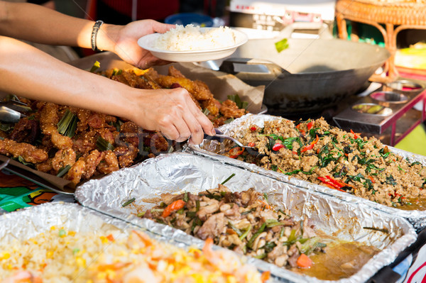 Eladó rizs wok étel utca piac Stock fotó © dolgachov
