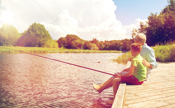 Grand-père petit-fils pêche rivière famille génération [[stock_photo]] © dolgachov