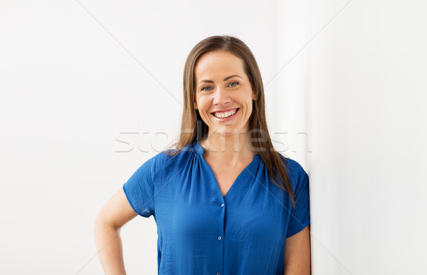 happy smiling middle aged woman Stock photo © dolgachov