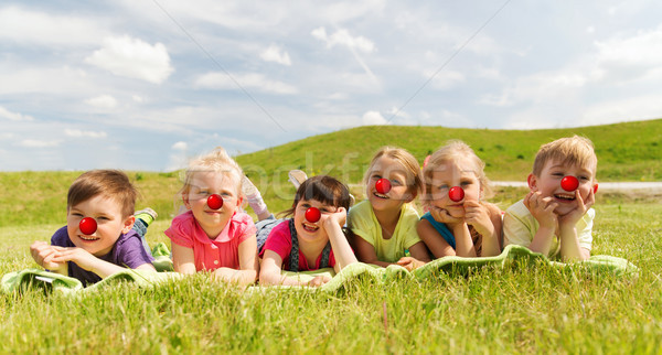 Stock fotó: Boldog · gyerekek · legelő · piros · orr · nap