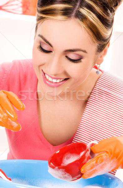 housewife washing dish Stock photo © dolgachov