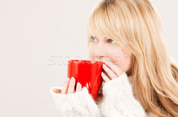 Stock photo: happy teenage girl with red mug