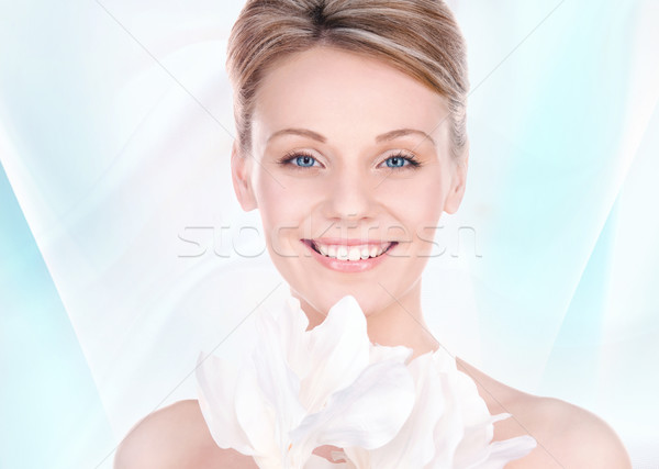 beautiful woman with madonna lily Stock photo © dolgachov