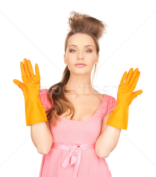 housewife with protective gloves Stock photo © dolgachov