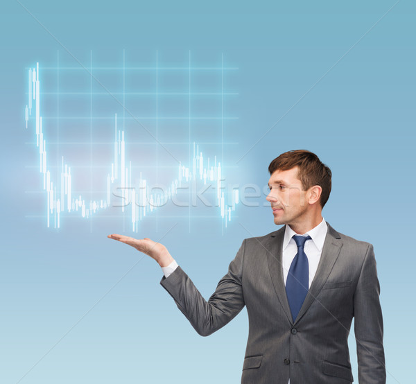 buisnessman or teacher showing forex chart Stock photo © dolgachov