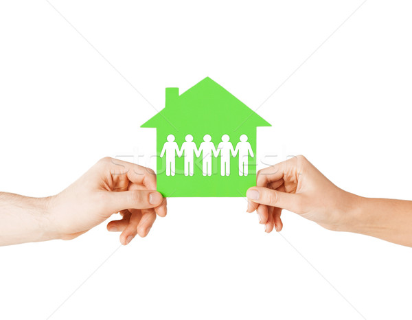 Człowiek kobieta ręce papieru domu nieruchomości Zdjęcia stock © dolgachov