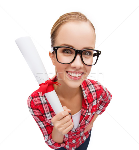 smiling woman in black eyeglasses with diploma Stock photo © dolgachov