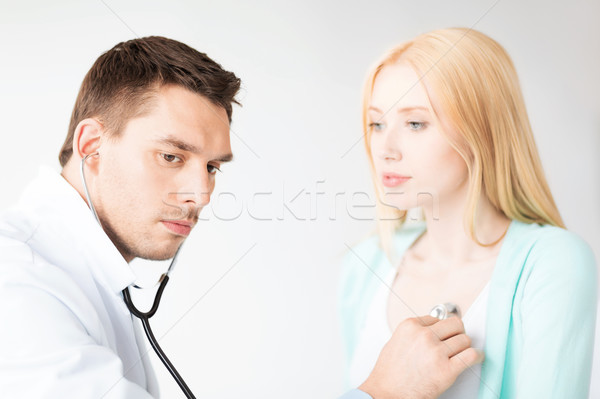 Stock photo: male doctor with patient