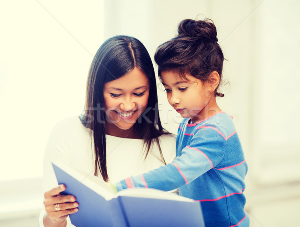 [[stock_photo]]: Mère · fille · livre · famille · enfants · éducation