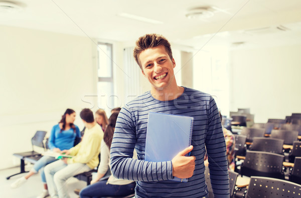 group of smiling students in lecture hall Stock photo © dolgachov