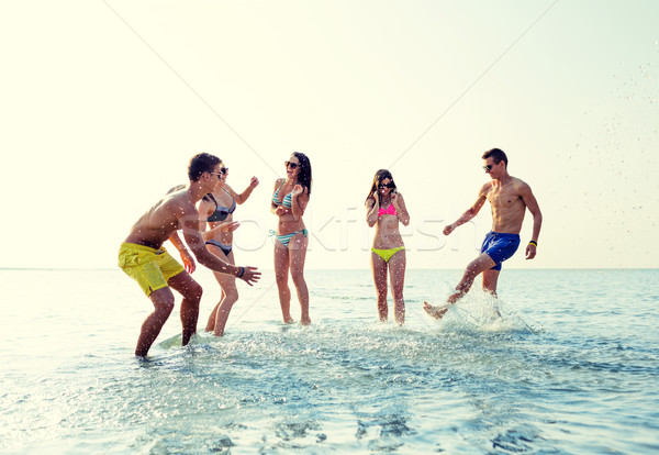 Stockfoto: Gelukkig · vrienden · zomer · strand · vriendschap