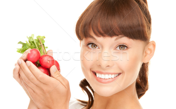 beautiful housewife with radish Stock photo © dolgachov