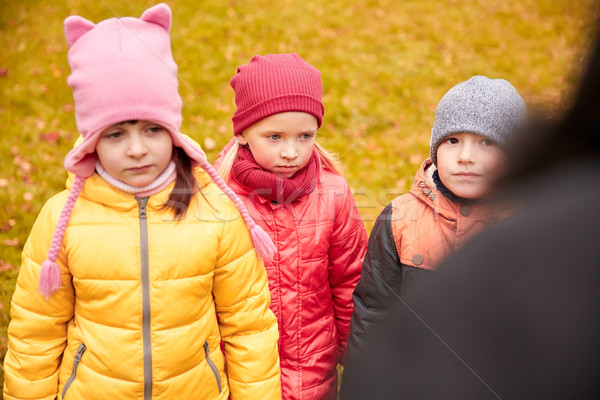 sad kids being blamed for misbehavior outdoors Stock photo © dolgachov