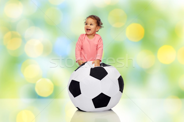 happy mulatto little baby girl playing with ball Stock photo © dolgachov
