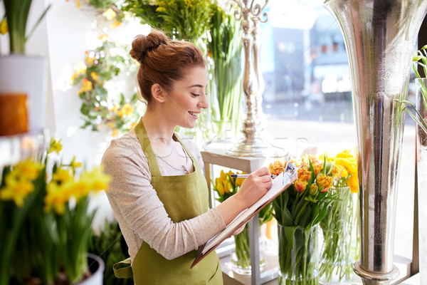 Blumengeschäft Frau Zwischenablage Blumenladen Menschen Verkauf Stock foto © dolgachov