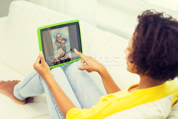 happy african american woman with tablet pc Stock photo © dolgachov