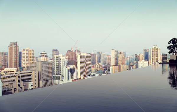 view from infinity edge pool to bangkok city Stock photo © dolgachov
