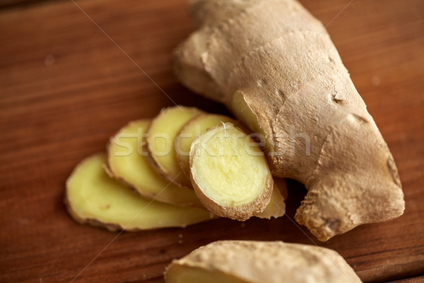 close up of ginger root on wooden table Stock photo © dolgachov