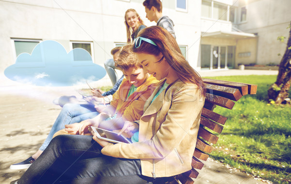 group of students with tablet pc at school yard Stock photo © dolgachov