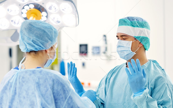 Cirujanos sala de operaciones hospital cirugía medicina personas Foto stock © dolgachov