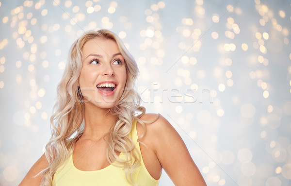 Szczęśliwy uśmiechnięty młoda kobieta blond włosy fryzura ludzi Zdjęcia stock © dolgachov