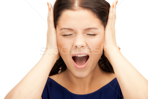 woman with hands on ears Stock photo © dolgachov