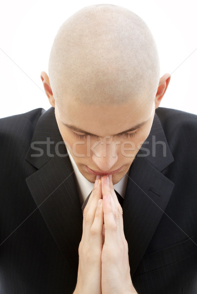 Imádkozik férfi portré fekete öltöny fehér arc Stock fotó © dolgachov
