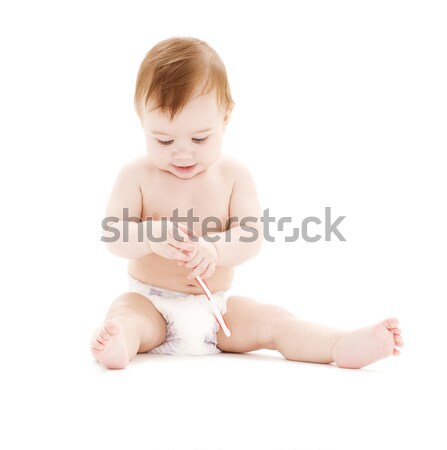 baby boy in diaper with toothbrush Stock photo © dolgachov