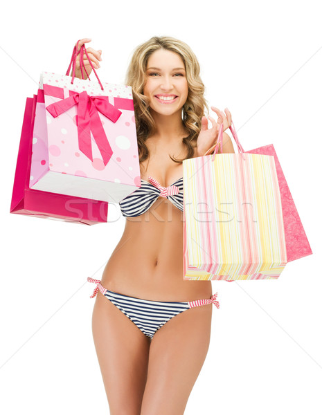 Csábító nő bikini bevásárlótáskák kép vásárlás Stock fotó © dolgachov
