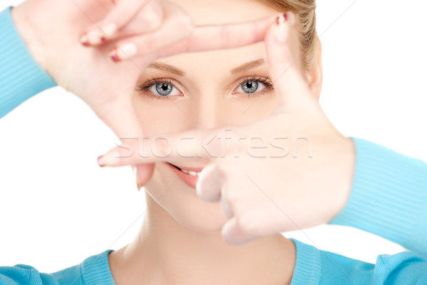 Kadın çerçeve parmaklar resim eller imzalamak Stok fotoğraf © dolgachov