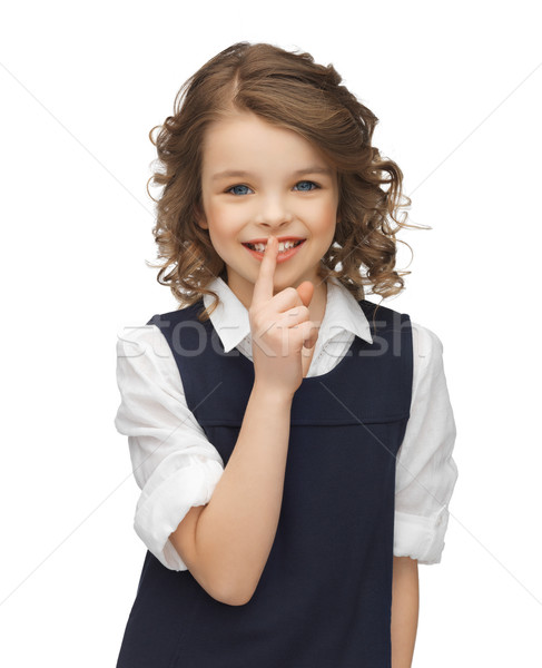 pre-teen girl showing hush gesture Stock photo © dolgachov