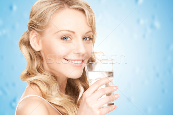 Kadın eller cam su Stok fotoğraf © dolgachov