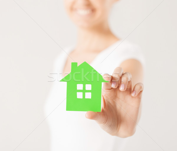 woman hands holding green house Stock photo © dolgachov