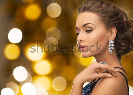 Kobieta kolczyki pierścień biżuteria piękna piękna kobieta Zdjęcia stock © dolgachov