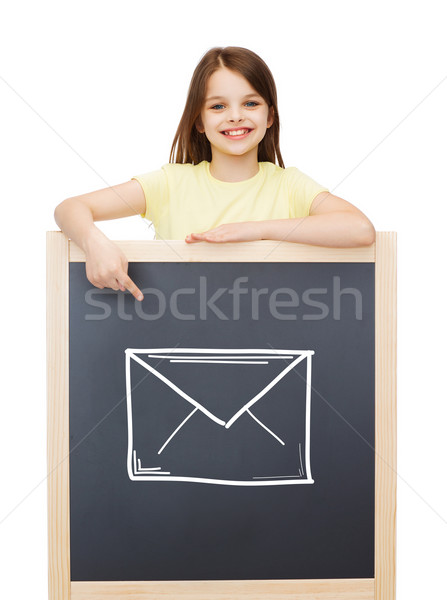 Sorridere bambina punta dito lavagna persone Foto d'archivio © dolgachov