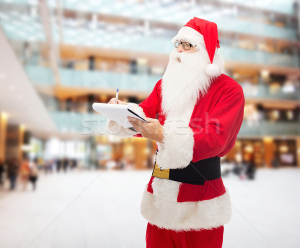 Człowiek kostium Święty mikołaj notatnika christmas wakacje Zdjęcia stock © dolgachov