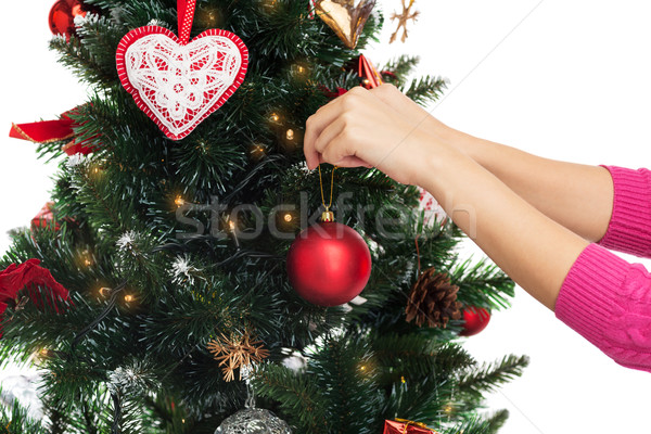 close up of woman with christmas tree decoration Stock photo © dolgachov