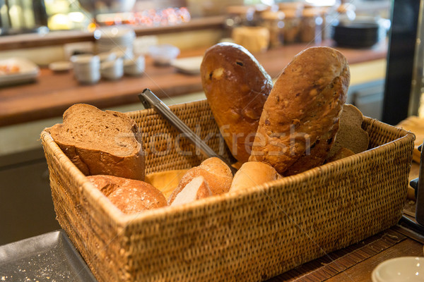 basket with bread at restaurant Stock photo © dolgachov